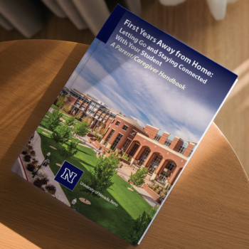 First Years Away handbook sitting on a coffee table